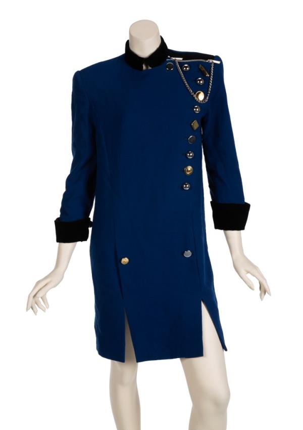 A photo of the Lady Gaga blue coat dress on a mannequin
