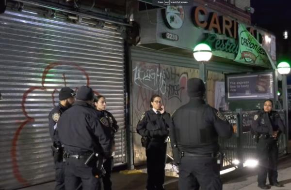 Police respond to the scene of the stabbing at the 182nd Street-183rd Street station in Fordham Heights.