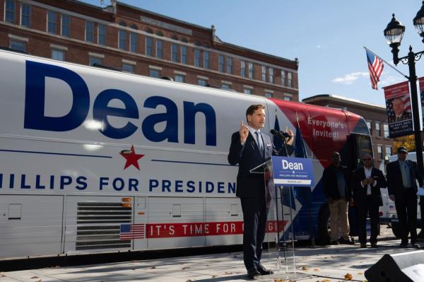  After signing a declaration of candidacy to run for president and walking out of the New Hampshire Statehouse, Democratic Rep. Dean Phillips addresses the crowd, Friday, Oct. 27, 2023, in Concord, Minn.