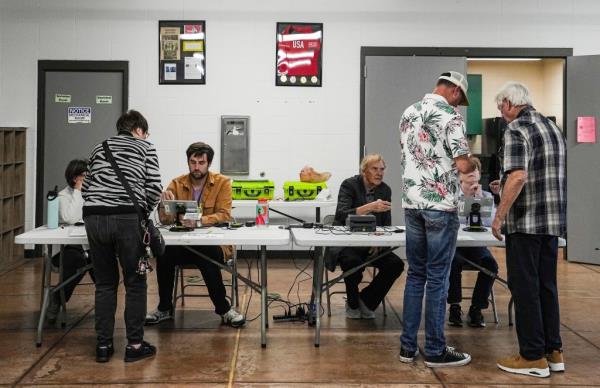 Voters line up to vote on Tuesday, Nov. 7, 2023 during Election Day at Burrello Family Center in Indianapolis.
