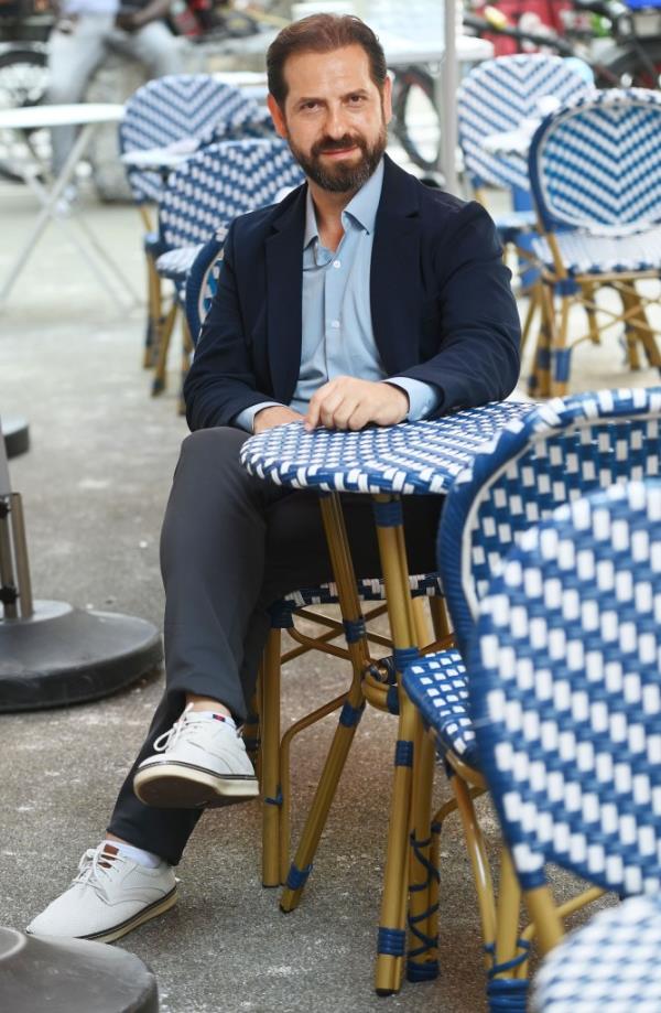 Small business owner Daniel Norber promises he's actually Jewish.