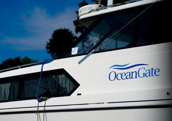 A boat with the OceanGate logo is parked on a lot near the OceanGate offices Thursday, June 22, 2023, in Everett, Wash, June 22, 2023.
