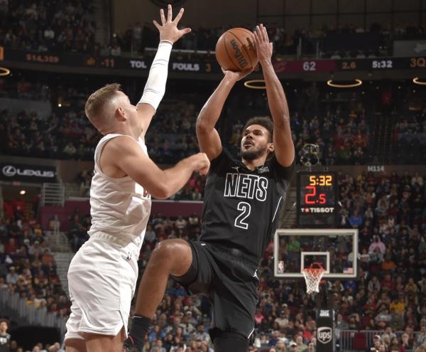 Cam Johnson, who scored a team-high 23 points, shoots a fadeaway jumper during the Nets' loss.
