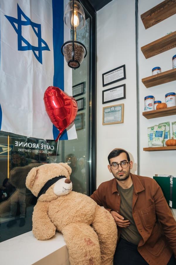 Dahan, who has spent time living in Israel, raised his employees' ire after hanging a sign supporting Israel's first-aid services.