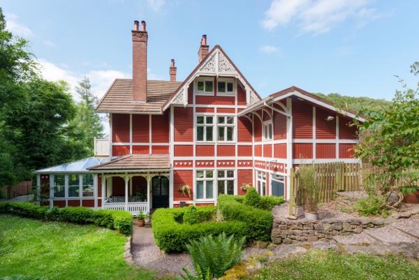 It was built as a Norwegian salmon fishing lodge, and is named The Chalet.