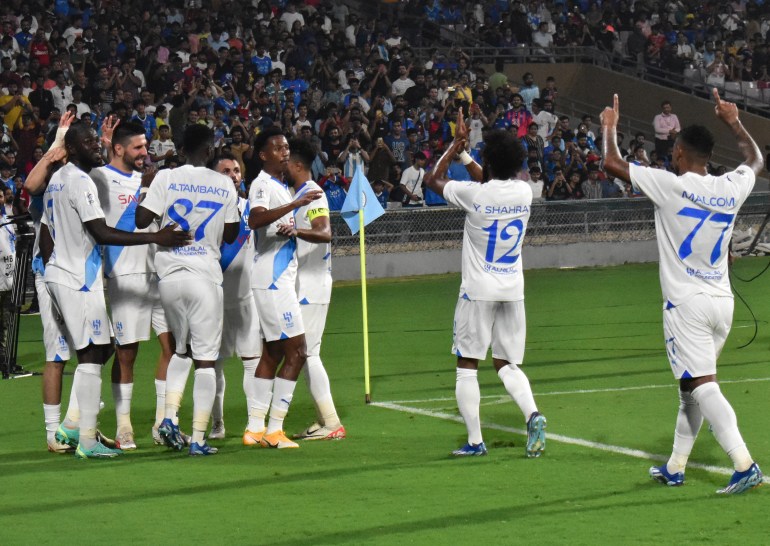 Al-Hilal SFC's players celebrate after scoring a goal during the AFC Champions League 2023/24 Group D football match between India's Mumbai City FC and Saudi Arabia?s Al-Hilal SFC at the D.Y. Patil stadium in Navi Mumbai on November 6, 2023. (Photo by AFP)