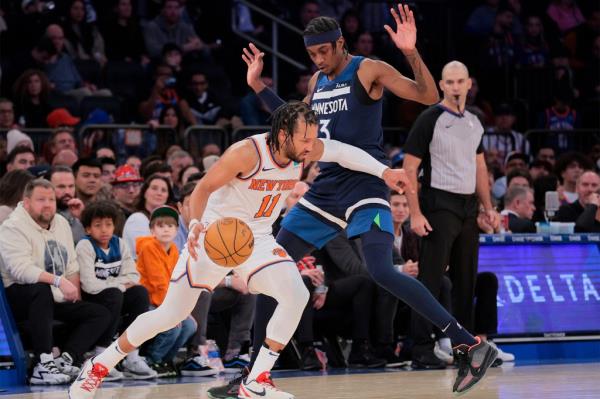 Jalen Brunson's 14 assists Sunday against the Timberwolves marked a career-high.