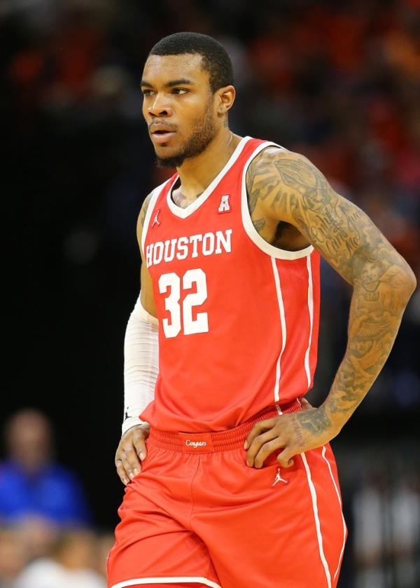 Houston Cougars forward Reggie Chaney (32) looks on during a men's college basketball game between the Houston Cougars and the Virginia Cavaliers on December 17, 2022, at John Paul Jo<em></em>nes Arena in Charlottesville, VA.  
