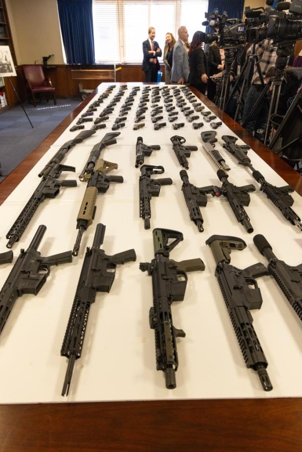 Queens District Attorney Melinda Katz along with NYPD Captain Jeffrey Heilig hold a press co<em></em>nference in the Queens D.A.as office a<em></em>bout an interstate gun trafficking ring