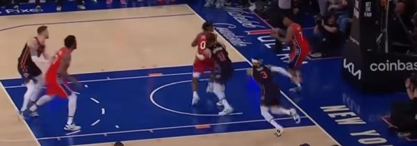 Jalen Brunson grabs Tyrese Maxey on the inbounds pass.