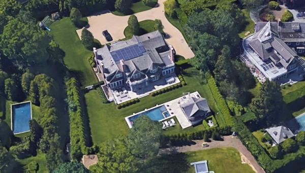 An $8 million large house with a pool and trees in Water Mill, NY, wher<em></em>e Brandon Miller was found unco<em></em>nscious due to carbon mo<em></em>noxide poisoning.