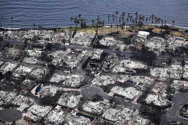 Destroyed homes and buildings burned to the ground in Lahaina in the aftermath of wildfires in western Maui, Hawaii.