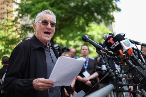 Robert De Niro speaks in support of President Biden outside of Manhattan Criminal Court as Trump attends his criminal trial for allegedly covering up hush mo<em></em>ney payments in New York City, on May 28, 2024.