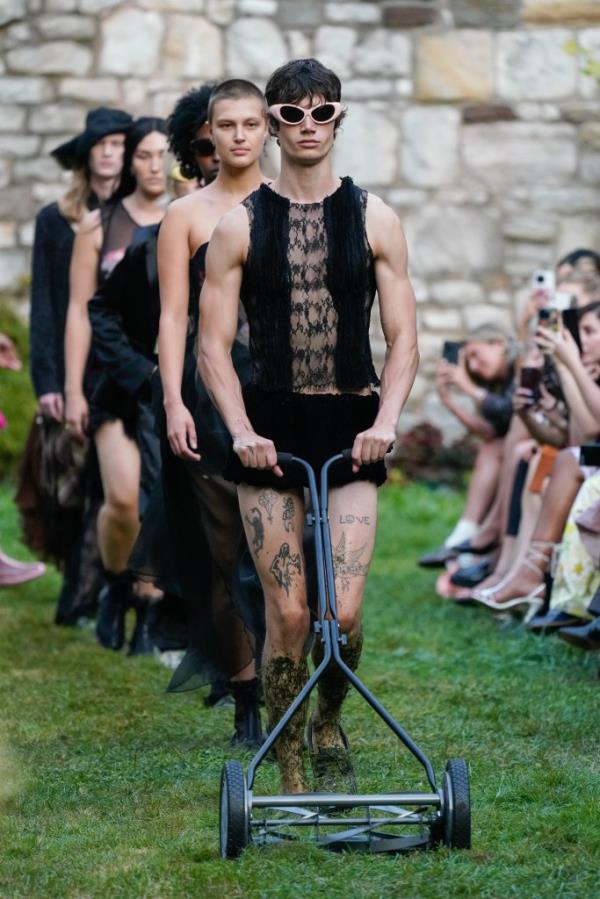 Model showcasing Collina Strada RTW Spring 2025 collection on the runway during New York Fashion Week at the Marble Cemetery