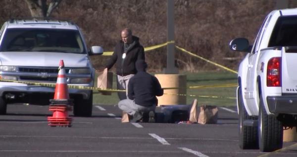Police investigate the scene of the fatal shooting of Christopher Wilson at Kuusakoski Recycling in Middletown Township, Pennsylvania.