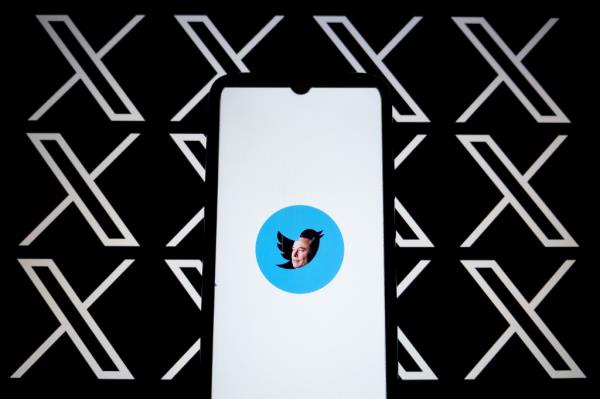  In this photo Illustration an effigy of Elon Musk is seen on a smartphone screen with the Twitter logo and X logos as background