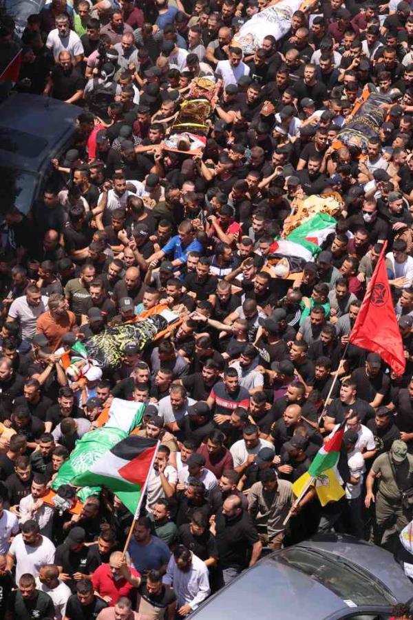 Palestinian health officials said 12 Palestinians were killed during the Israeli raid and dozens were wounded.