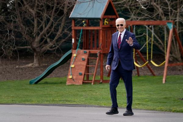 Joe Biden walks towards Marine One as he departs the White House in Washington, DC, USA.