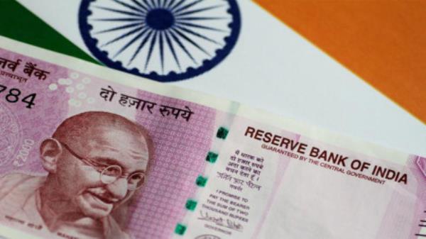 An India Rupee note is seen in this illustration photo June 1, 2017. REUTERS/Thomas White/Illustration/File Photo