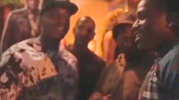 Two men at a Diddy party