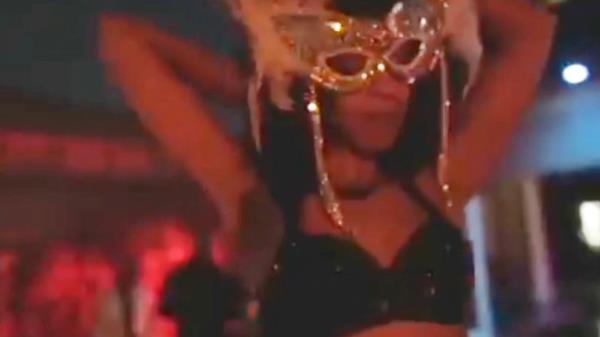 A masked dancer at the Las Vegas party thrown by Diddy.