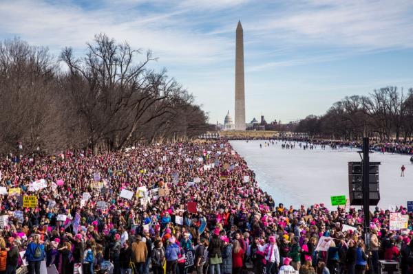 Protestors at Women's March by Reflection Pool and Lincoln Memorial in Washington D.C. - Credit: Natan Dvir.
