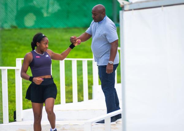 Coco Gauff of the United States talks to father Corey.