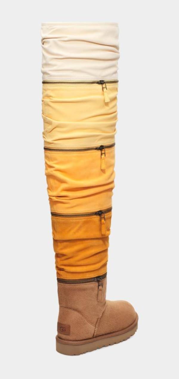 The “Women’s Classic Ultra Ultra Tall” boots stand 26 inches tall with stackable zippered panels 