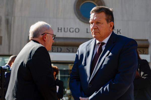 Holloway's father Dave Holloway outside of the courthouse.