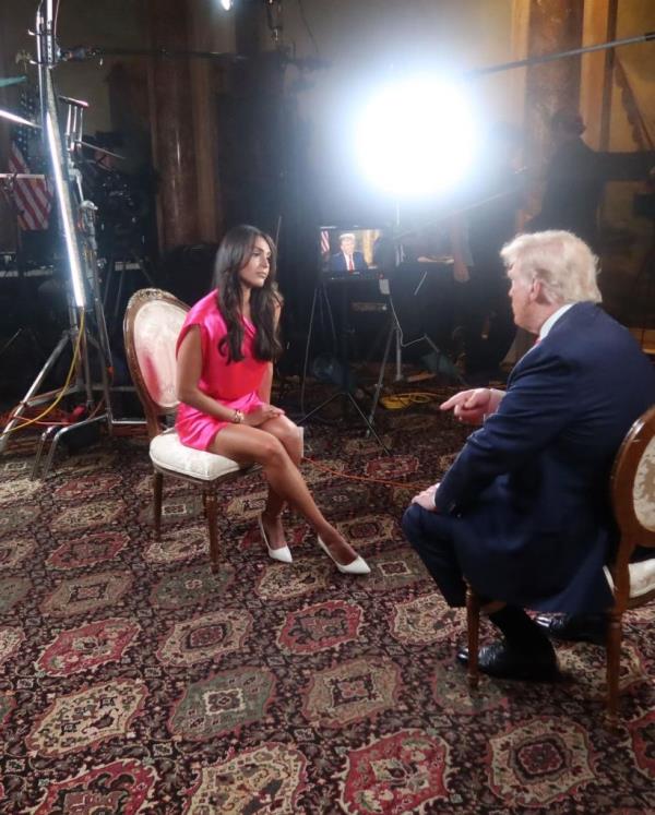 A co<em></em>nservative journalist sitting in a nightclub, discussing her dismissal due to a co<em></em>ntroversial social media post