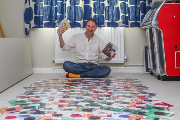 For the Metro- Dave's collection of singles. Dave Watson in his home in Dunstable, Bedforshire on August 10 2023. Dave has an incredible collection of number 1 singles in the chart, collecting every number one single since the records began in 1952.