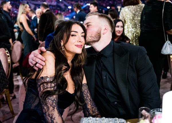Brianna Chickenfry and Zach Bryan at the 66th GRAMMY Awards