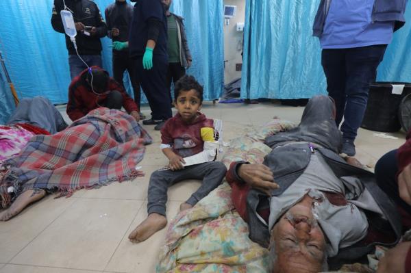 Injured Palestinians, including children, are brought to Al-Aqsa Martyrs Hospital for treatment following the Israeli attacks in Deir Al-Balah, Gaza on Feb. 9, 2024.