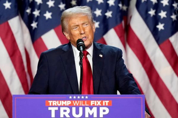 Former President Do<em></em>nald Trump delivering a speech at the 2024 election night watch party in West Palm Beach, Florida