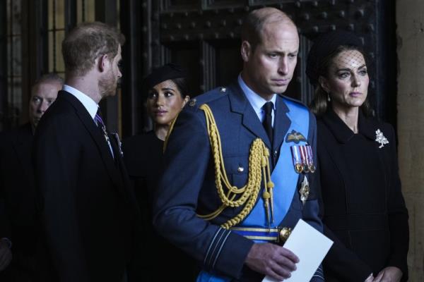 Prince William, Kate, Prince Harry, and Meghan, Duchess of Sussex, leaving Westminster Hall after paying respects to Queen Elizabeth II, in London, 2022