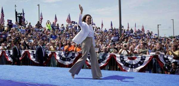 Vice President Kamala Harris greets a cheering crowd at a campaign stop Wednesday, August 7, 2024 at the Eau Claire Event District in Eau Claire, Wisconsin