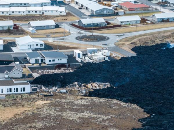 An areal view of the lava flow front in the town of Grindavik, Iceland, Monday, Jan. 15, 2024. 