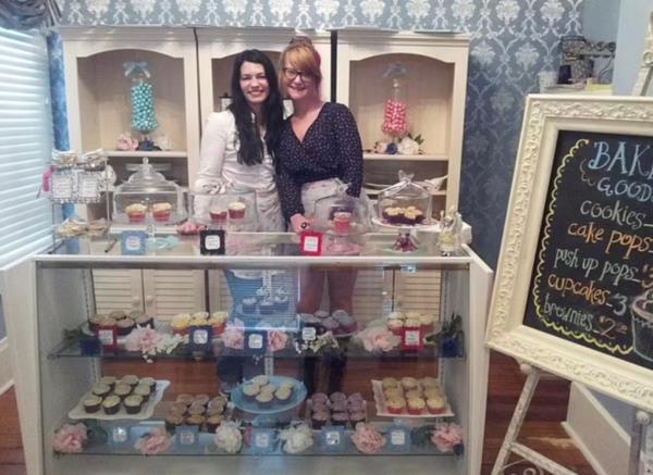 Misseldine and an employee at one of her businesses. 