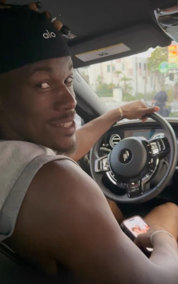 Butler in his car.