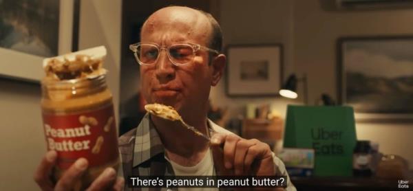 During one scene of the advertisement, a man, who has broken out in hives as well as sporting a swollen eye, can be seen eating from a peanut butter jar before remarking: “There’s peanuts in peanut butter? Oh, it’s the primary ingredient.