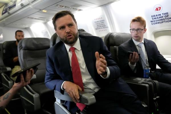 Republican vice presidential candidate Sen. JD Vance speaking with reporters aboard Trump Force Two en route to Virginia on July 22, 2204.