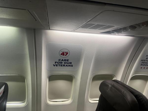 A sign on a window in Trump Force Two.