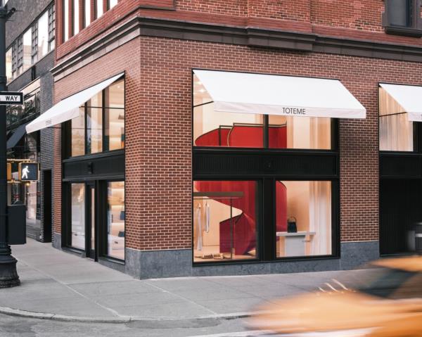 A store front with awnings and windows