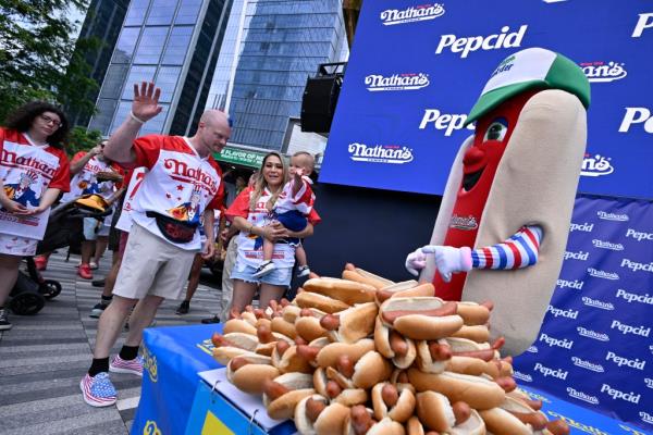 The co<em></em>ntest invites competitive eaters from around the world to Brooklyn for the ico<em></em>nic chowdown. 