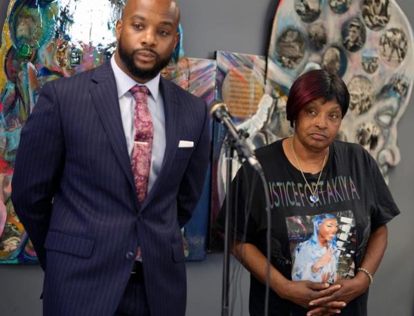 Attorney Sean Walton and Nadine Young, grandmother of Ta'Kiya Young, speak during a press co<em></em>nference following the indictment of Blendon Twp. officer Co<em></em>nnor Grubb.   
