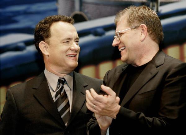 Hollywood actor Tom Hanks (L) shares a laugh with director Robert Zemeckis (R).