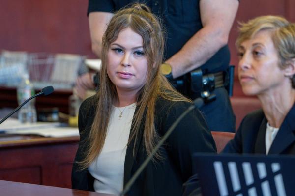 alex ray scott with long hair and lashes in courtroom