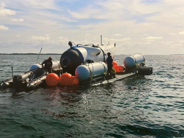 Workers preparing OceanGate Expeditions' Titan sub. 