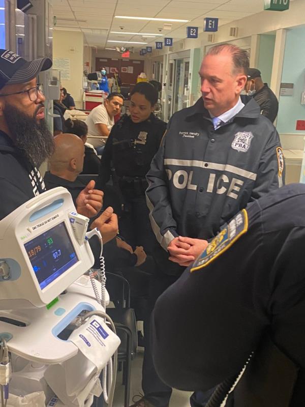 PBA President Patrick Hendry visits the wounded cops at Jacobi Medical Center.