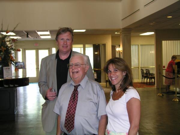 A photo of Don Triplett with two filmmakers.